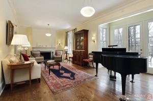 Living room with large piano