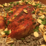 الدجاج المشوي مع الأرز المبهر باللحمة المفرومة والمكسرات‎