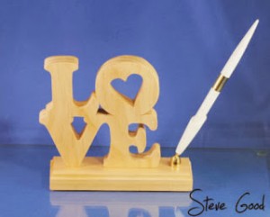 تصميم رومانسى رائع لمقلمة مكتب من الأركت تحمل كلمة LOVE